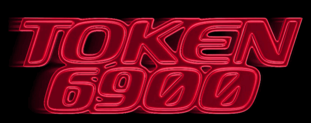 真紅に輝く立体文字で「TOKEN 6900」と描かれたロゴが黒背景に浮かび上がっている。サイバー感のあるフォントと光沢のあるデザインが、革新的かつ注目度の高い仮想通貨プロジェクトであることを印象付けている。